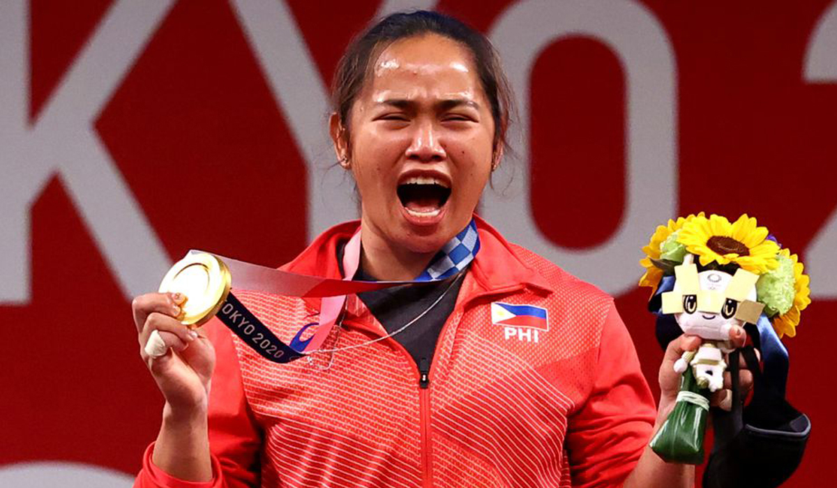 Philippines’ first-ever Olympic gold medalist Hidilyn Diaz wins $660,000 and a house